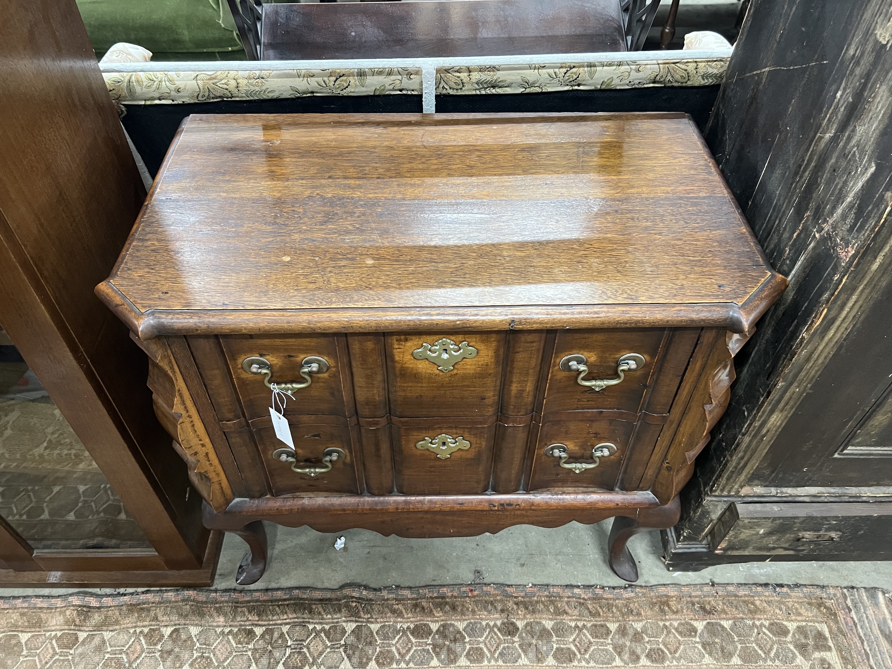 A Dutch style mahogany and walnut two drawer chest, width 82cm, depth 45cm, height 75cm